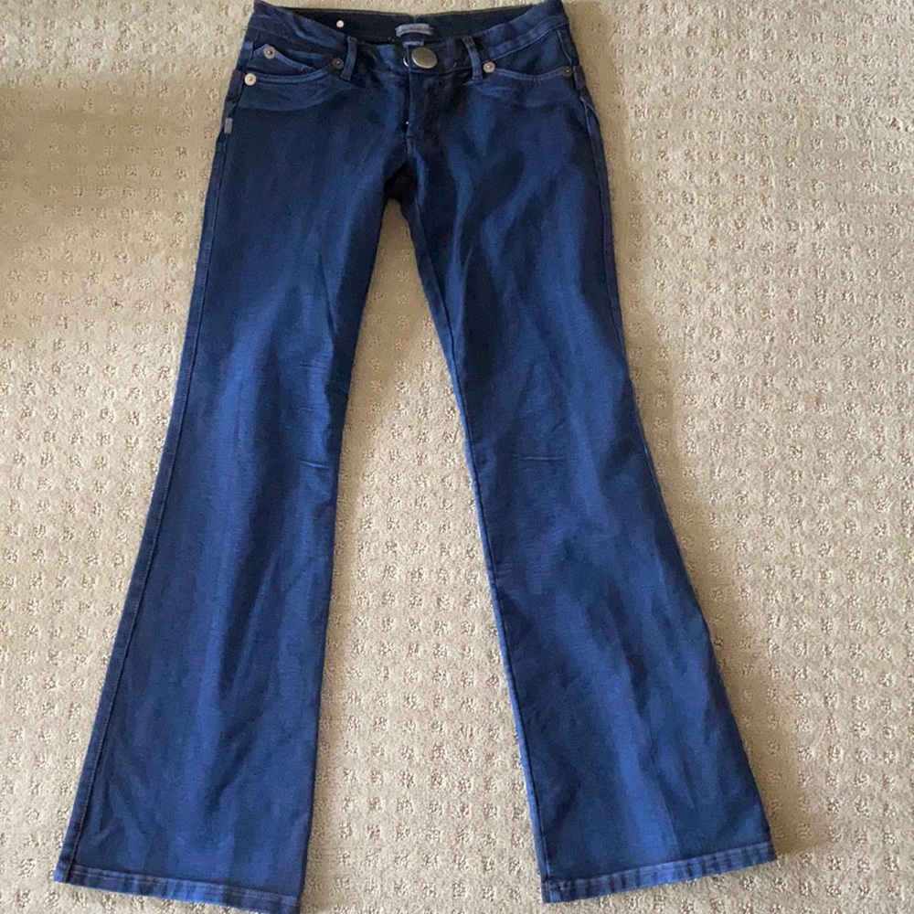 Flared, low cut stretch jeans by Virgin Only.
